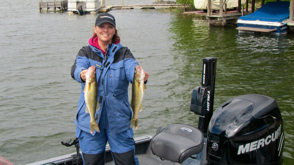 Holly holding two walleyes
