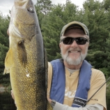 Al Lindner holding a walleye